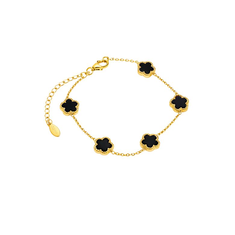 Elegant gold Bracciale Donna Acciaio Dorato with black resin flower details. Lobster clasp with adjustable chain, stylish jewelry.