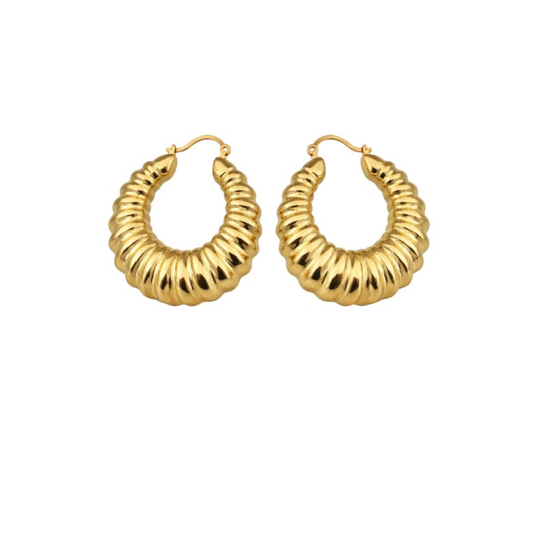 Close-up of gold-plated, ribbed, Bombati hoop earrings. Stylish, modern design.