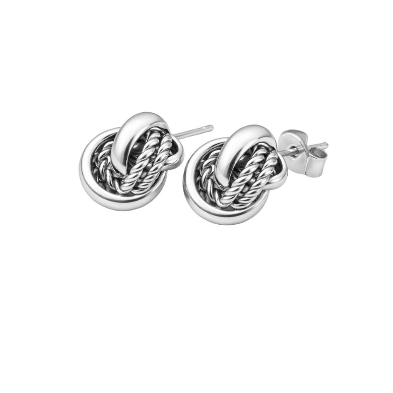 Close-up of silver knot earrings, showcasing the twisted design and butterfly clasp.