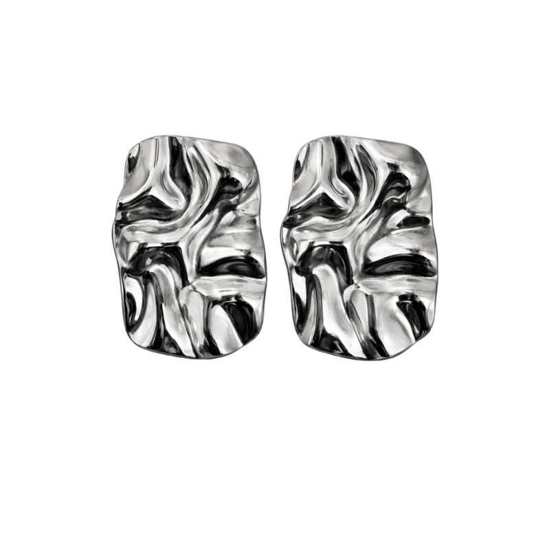 Close-up of silver-tone Orecchini Effetto martellato in Acciaio Argentato earrings, showing the hammered texture and stud detail.