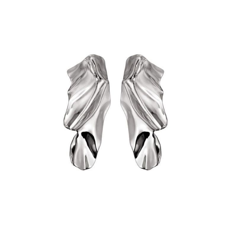 Close-up of Orecchini Maxi Effetto Scultoreo In Acciaio Argentato, silver steel, sculptural design earrings on white background.