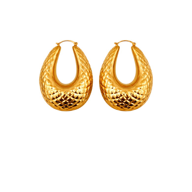 Close-up of Orecchini Pendenti Bombati in Acciaio Dorato, showcasing the gold color, textured surface, and contemporary design.