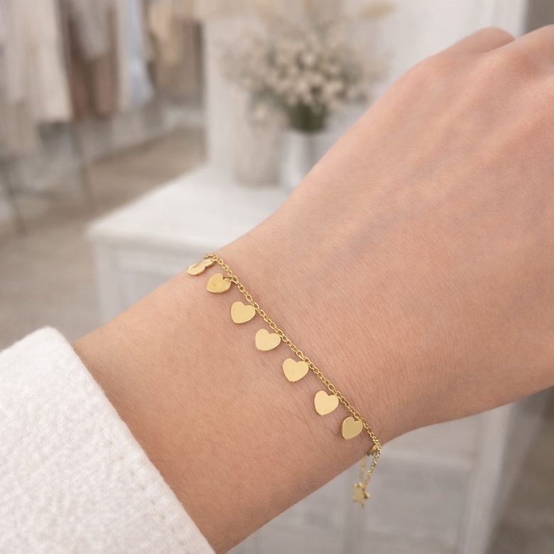 Bracciale in Acciaio dorato con cuori piccoli pendenti - immagine 2