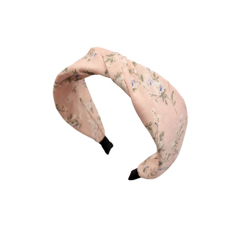 cerchietto in raso a fantasia floreale con nodo frontale e colorazione rosa pesca