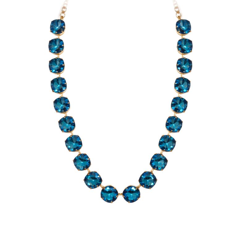 collana in acciaio dorato con cristalli azzurri luminosi