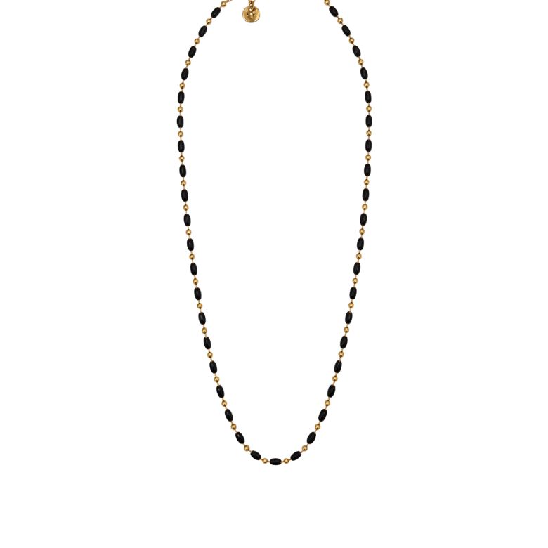 collana in acciaio dorato con elementi neri ovali e dettagli luminosi