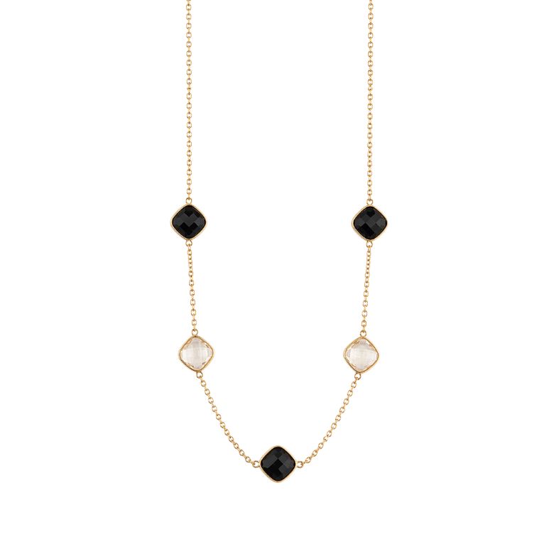 Elegante collana in acciaio dorato con pietre nere e cristalli trasparenti. Gioiello femminile di lusso.