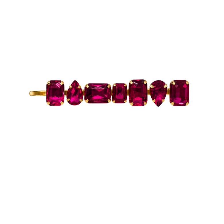 Elegante molletta per capelli dorata con pietre fucsia multiforma. Accessorio moda.